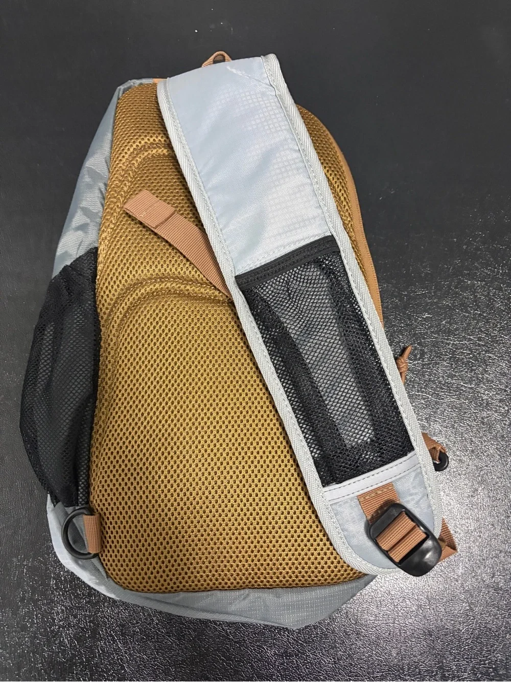Bass Pro Shops Gray Sling Backpack with Tan Accents